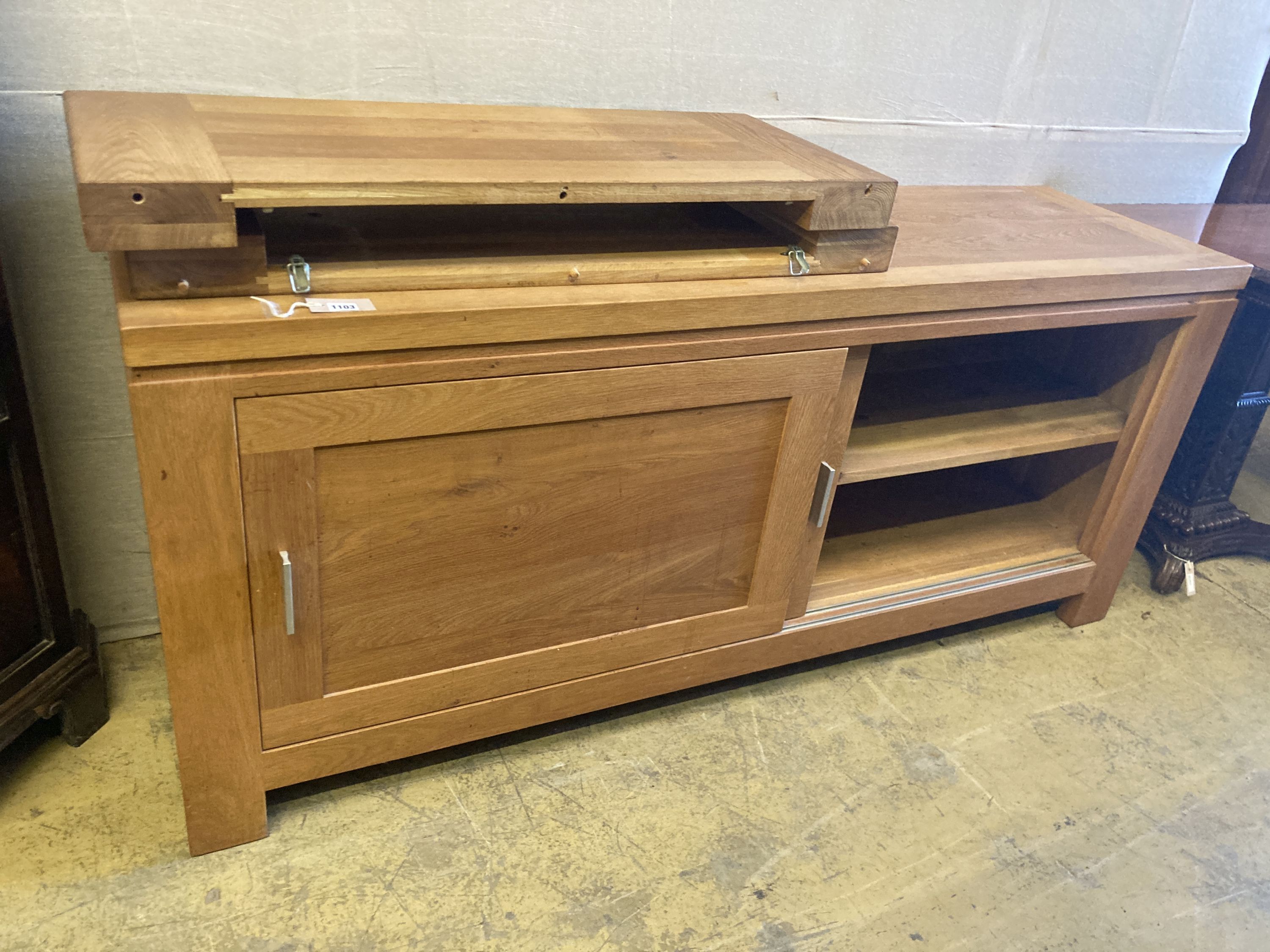 A contemporary oak dining suite,